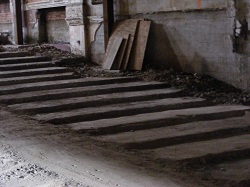 Old auditorium floor after most of the debris removed