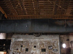 Projection booth with balcony i-beam above